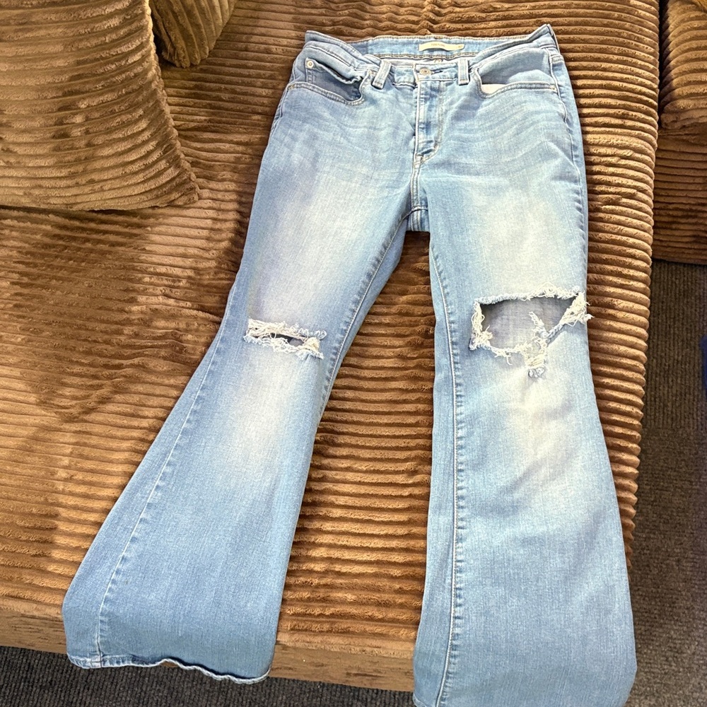 Levi's Light Blue Flare Jeans with Distressed Details